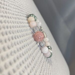 Green pink light pink and clear bracelet give size of wrist for perfect fit.